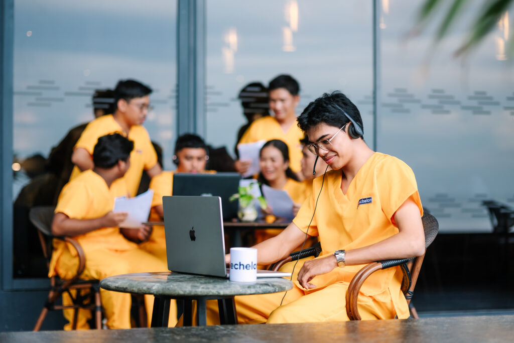 a group of people wearing matching yellow uniforms